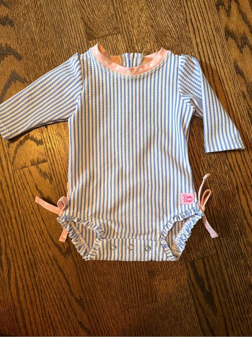 Ruffle Butts Blue and White Striped One-Piece with Pink Trim